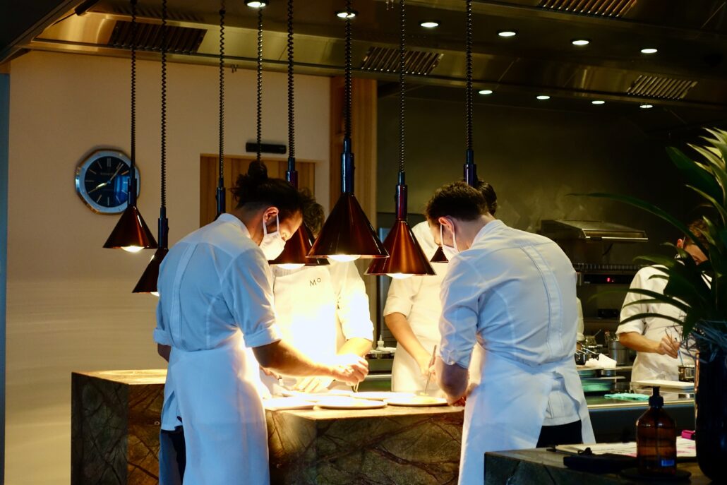 chefs putting on the finishing touches at Sven Wassmer's Memories at Grand Resort Bad Ragaz, Switzerland