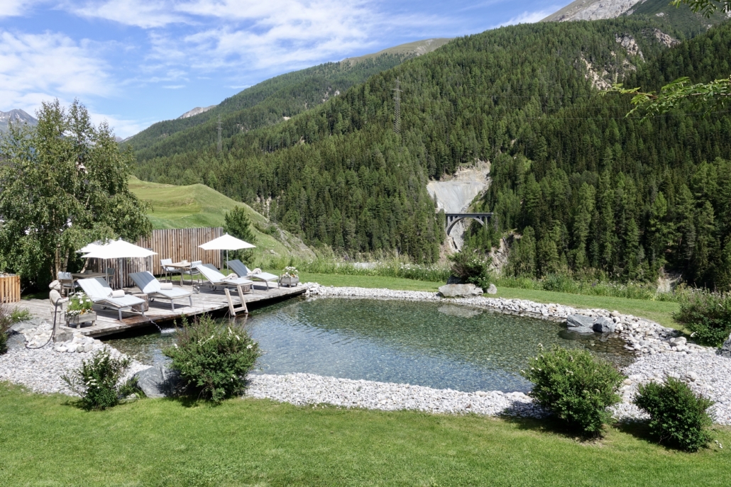 swimming pond at In Lain Hotel Cadonau Brail Lower Engadine Switzerland to stay in style