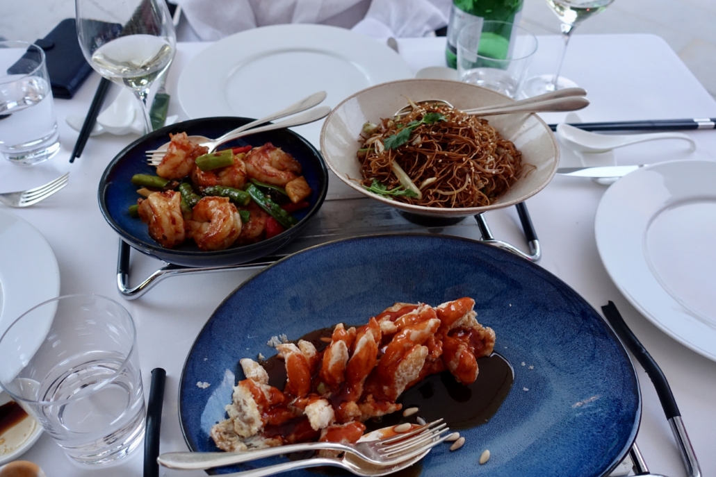 sweet & sour sea bass in the front, prawns with garlic & chili pepper and chicken noodles & bean sprouts in the back at Restaurant Tse Fung at Hotel La Réserve Geneva 