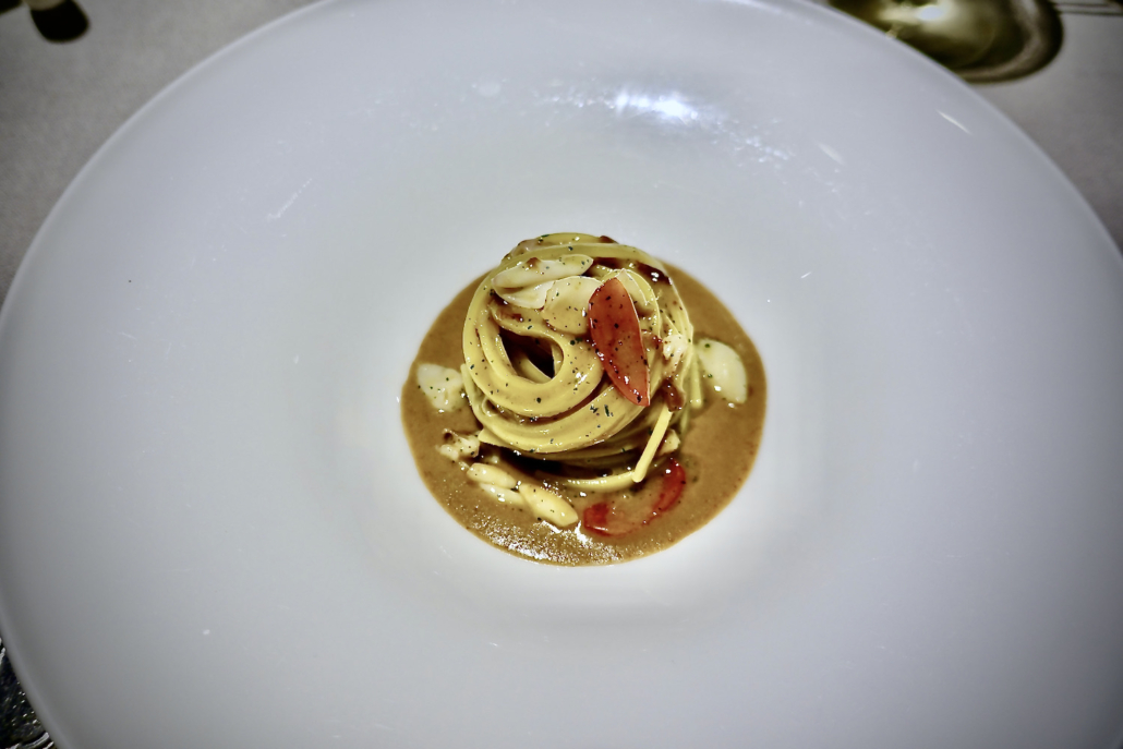 linguine with squid at 2-star Michelin restaurant Villa Crespi Lake Orta, Italy