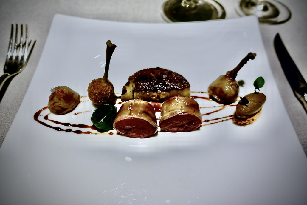 signature dish (pigeon with foie gras) at 2-star Michelin restaurant Villa Crespi Lake Orta, Italy